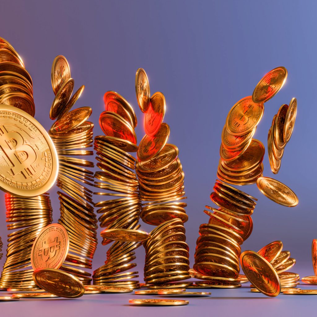 Cryptocurrency Bitcoin golden coins spilling on the table. Crypto investment concept background